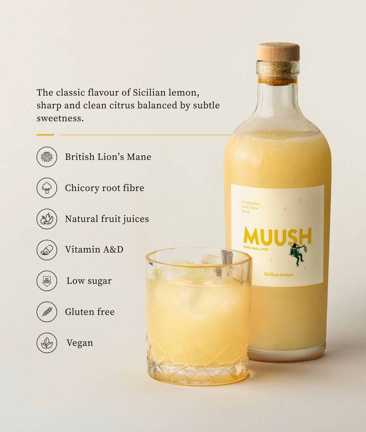 Bottle of MUUSH SICILIAN LEMON ELIXIR juice with a glass of juice on a light background