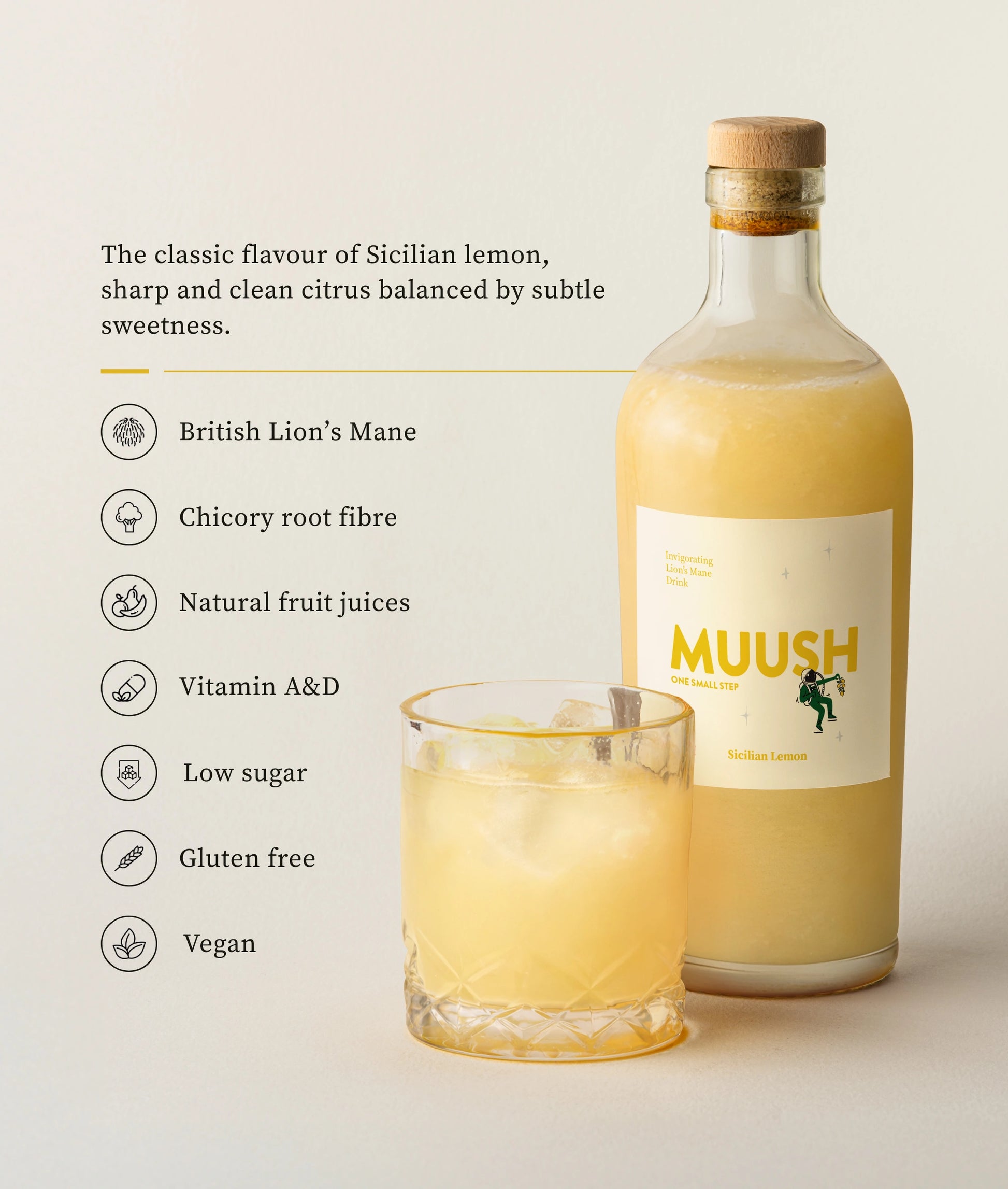 Bottle of MUUSH SICILIAN LEMON ELIXIR juice with a glass of juice on a light background